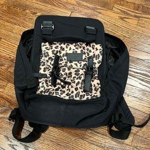 Black and leopard backpack